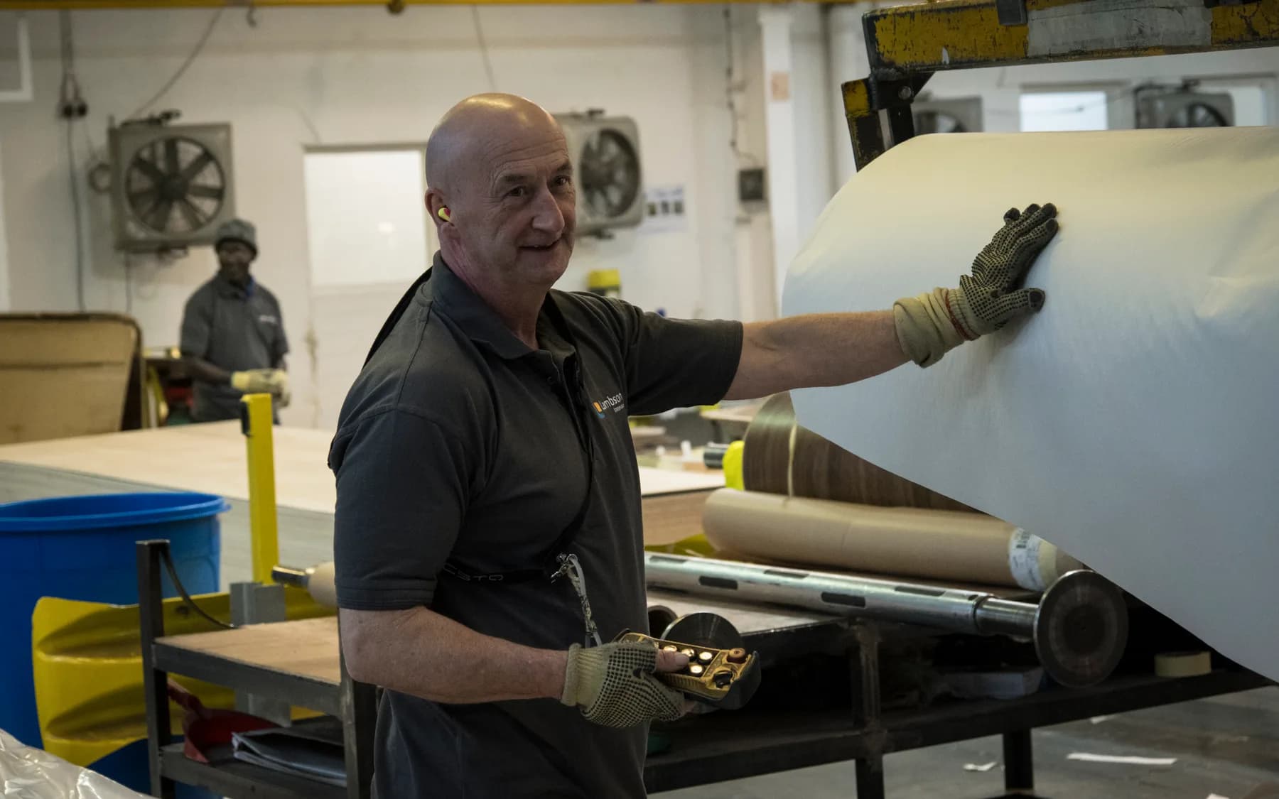 Handling a roll of laminate on the shop floor